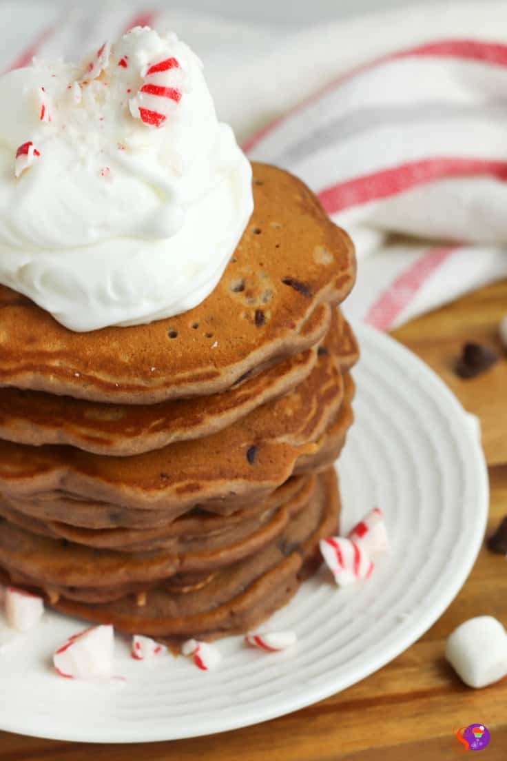 Put a smile on your little elves' faces with these easy homemade hot Chocolate Peppermint Pancakes recipe.