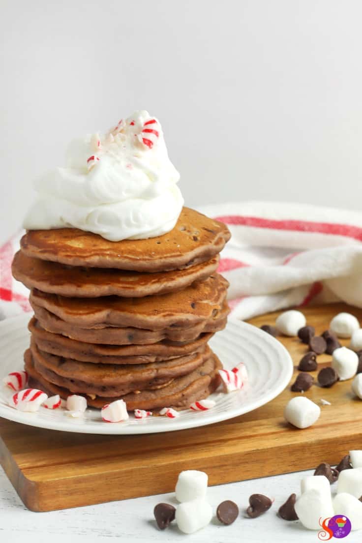 Made with hot chocolate and peppermint extract, these light and fluffy Hot Chocolate Peppermint Pancakes make a wonderful winter or holiday treat!