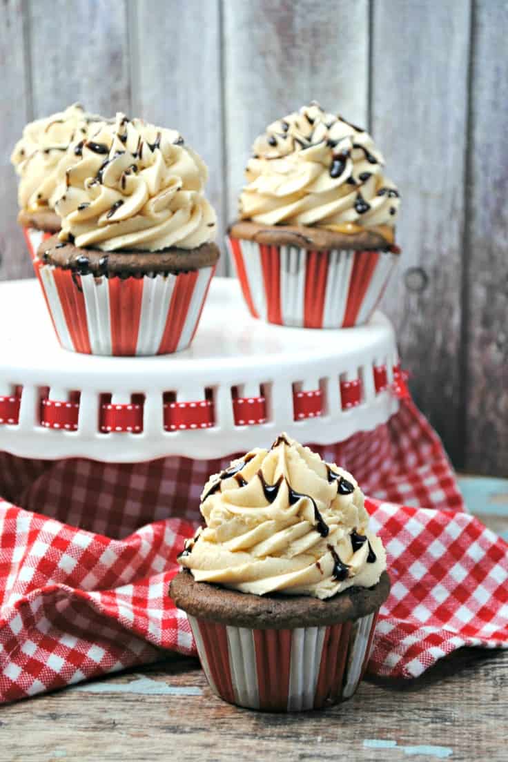 These rich, moist and creamy Chocolate Peanut Butter Cupcakes take the chocolate-and-peanut-butter flavor combination to a whole new level of deliciousness!