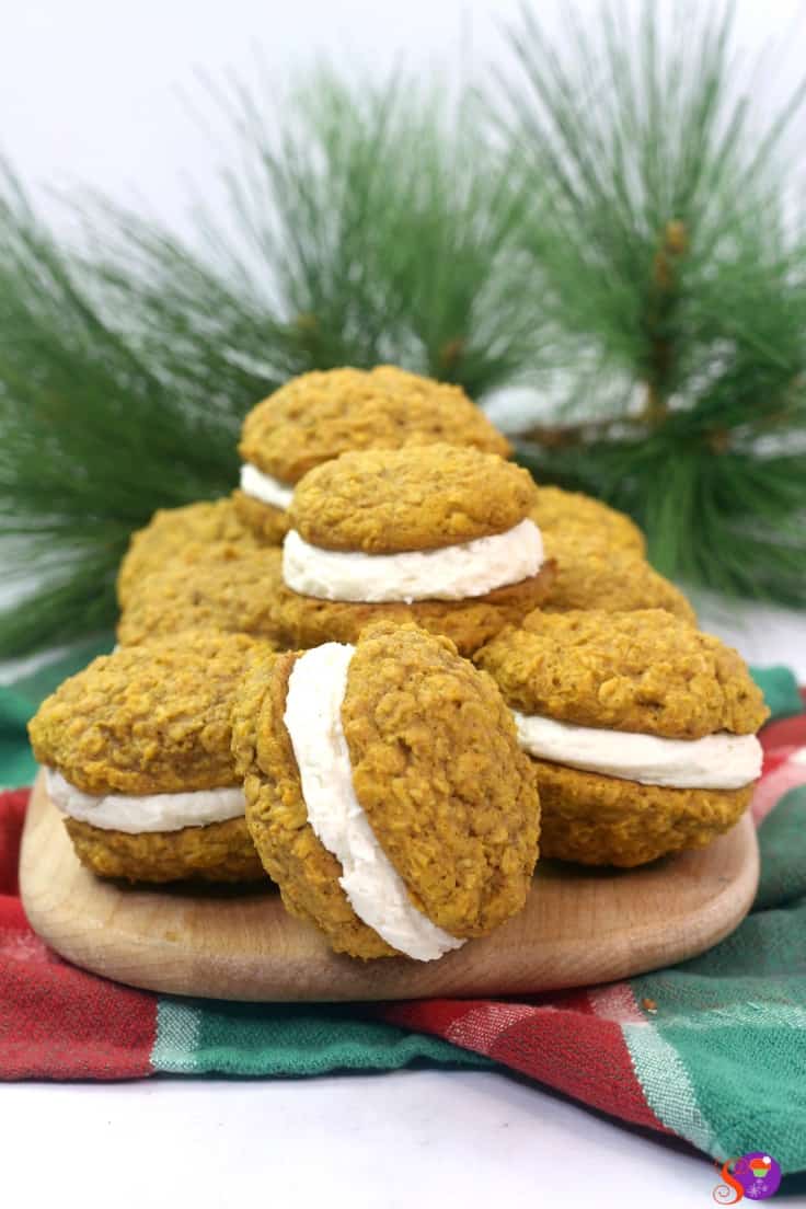 Light and fluffy homemade vanilla filling is sandwiched between two soft and chewy pumpkin oatmeal cookies to make a perfectly spiced Pumpkin Oatmeal Cream Pie! 