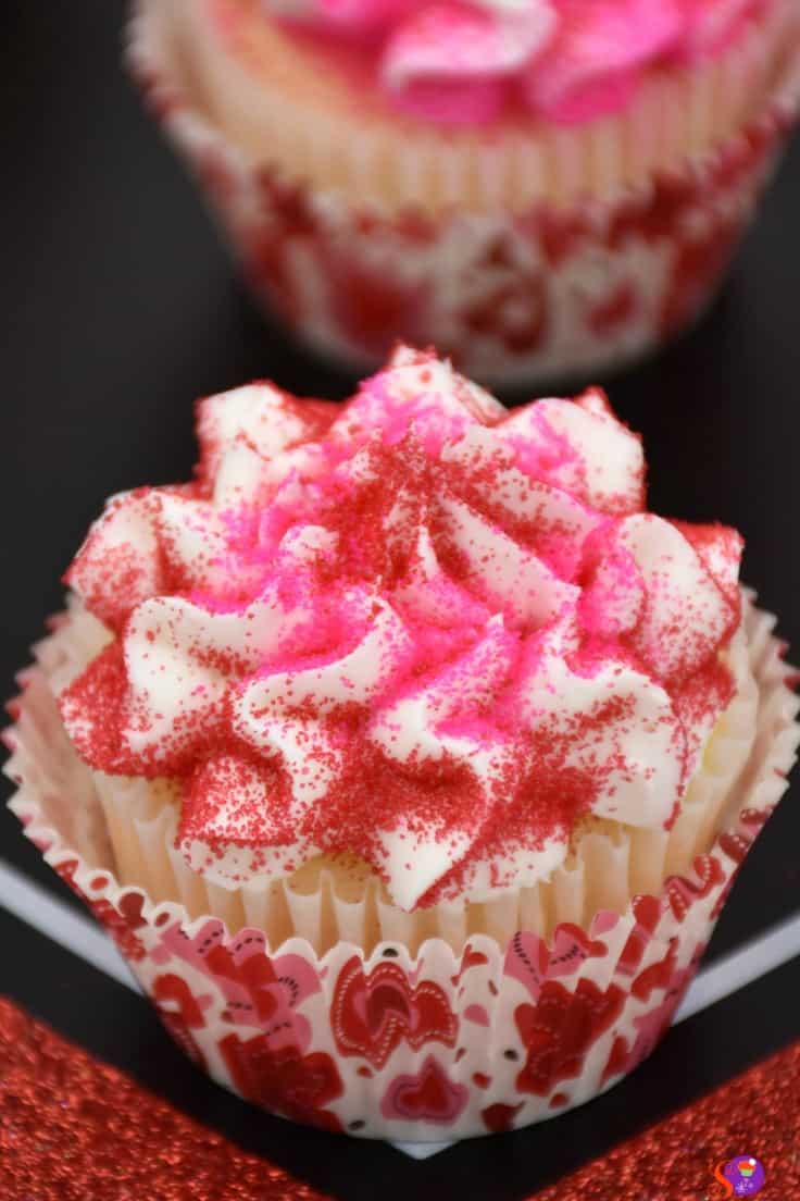 Rich vanilla cupcakes topped with a delicate homemade vanilla buttercream frosting and colorful sprinkles, these delicious Valentine's Cupcakes are filled with flavor and so easy to make. They're the perfect treat for the one you love!