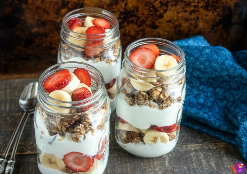 strawberry banana parfait with homemade granola recipe served in jars