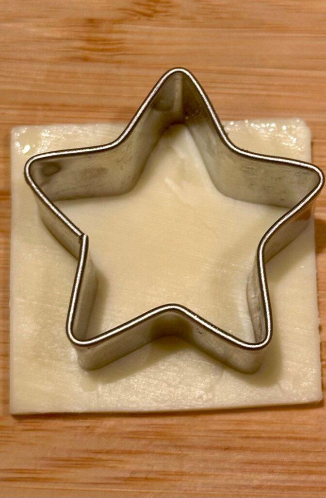 Place Star Cookie Cutter on Slice of Cheese