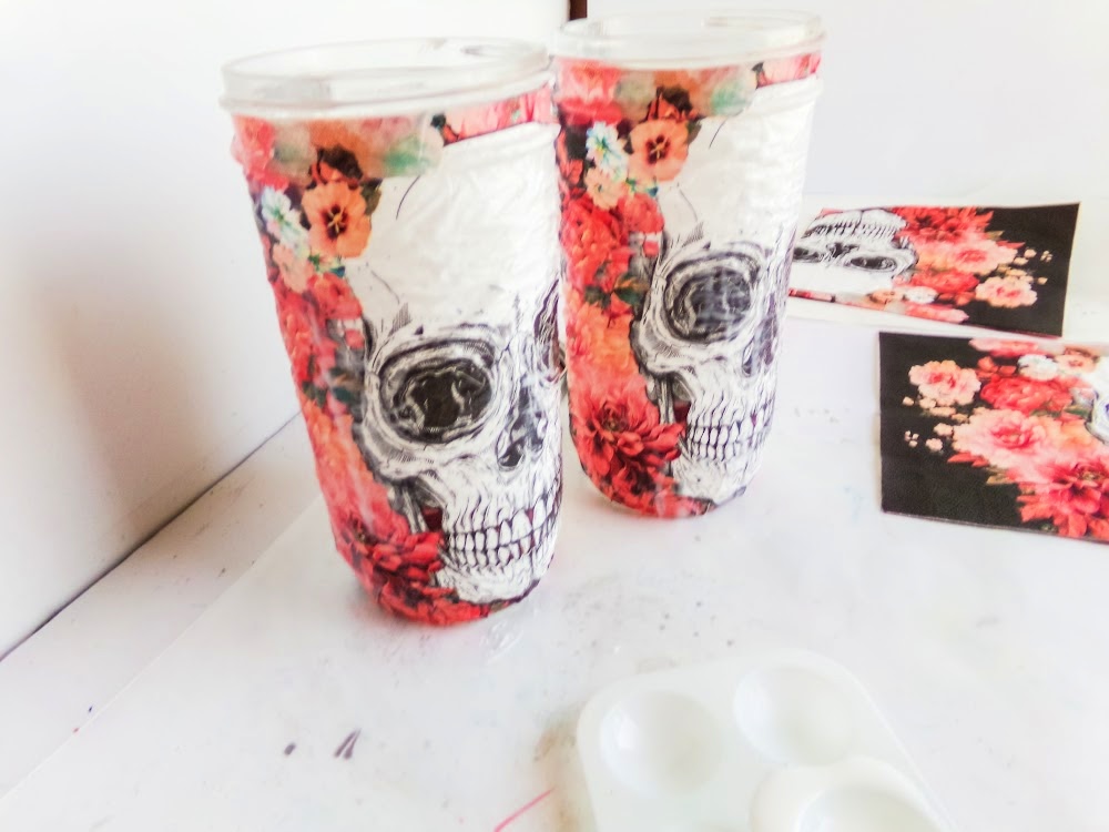 Skull Cookie Mix in a Jar 8 Two tall cups decorated with skulls and colorful floral patterns, placed side by side on a white surface.
