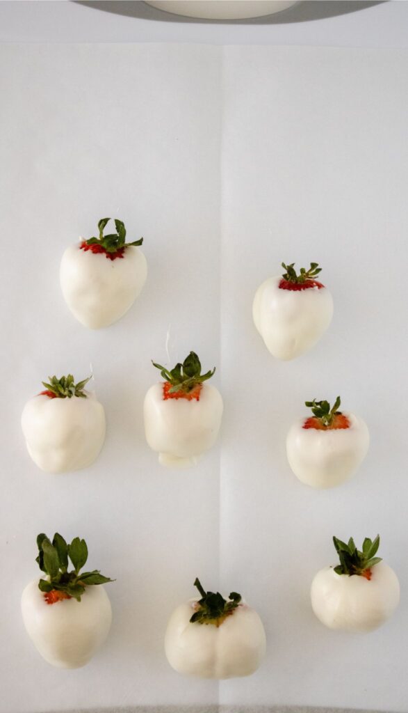 Chocolate Covered Strawberry Bunnies - Easy Easter Dessert 6 Place Chocolate Covered Strawberries on Parchment Paper