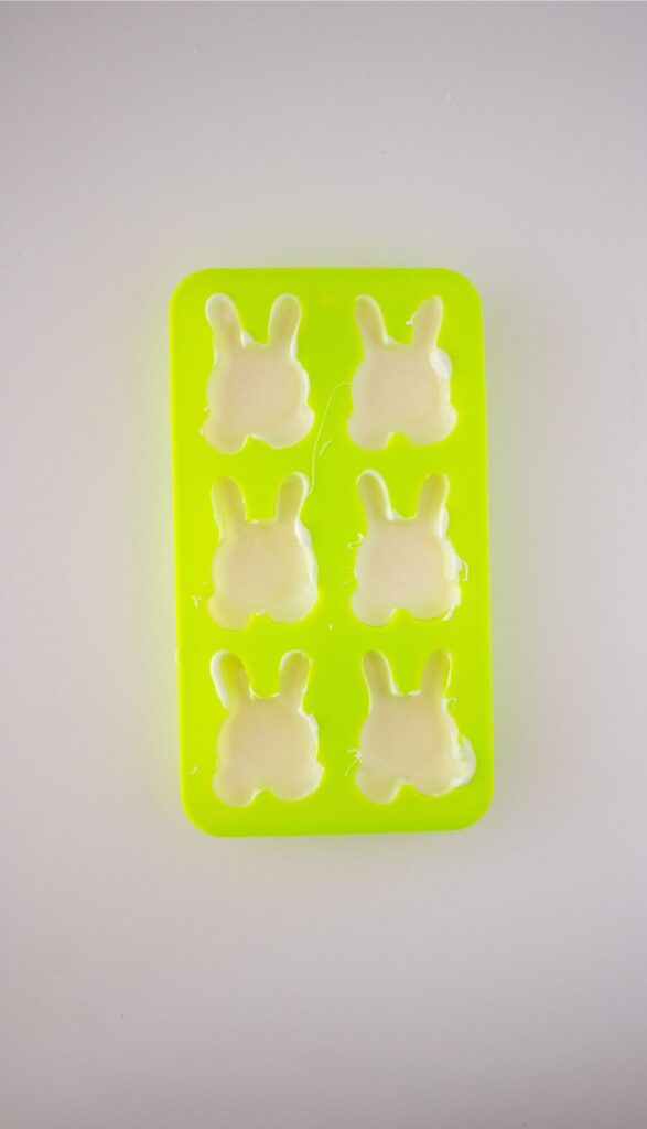 Chocolate Covered Strawberry Bunnies - Easy Easter Dessert 7 Poured extra chocolate in bunny mold for Chocolate Strawberry Bunnies